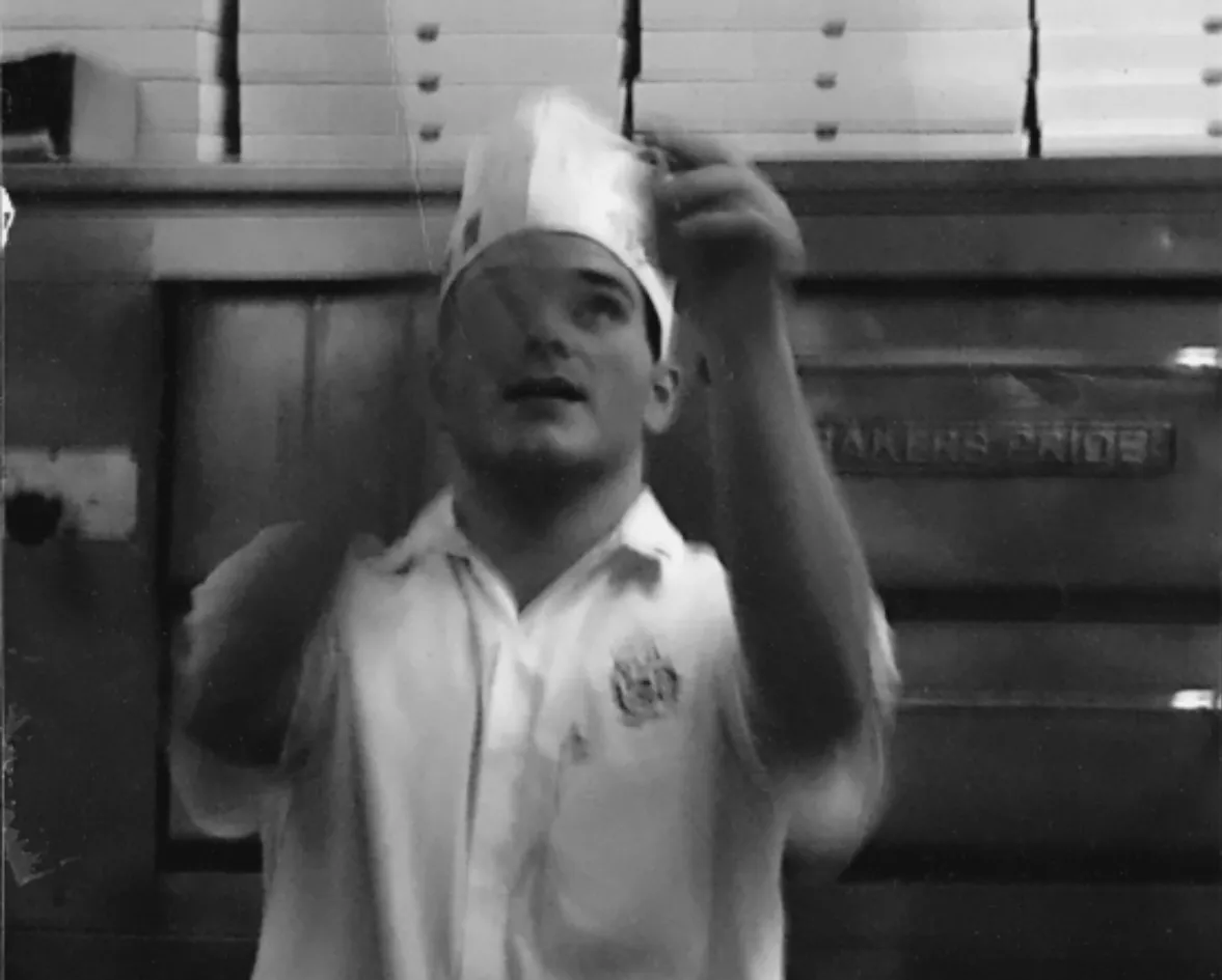 A black and white photograph from behind the counter in the early years