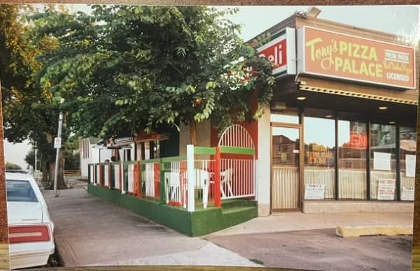 The Tony's storefront in its early years, awning and signage