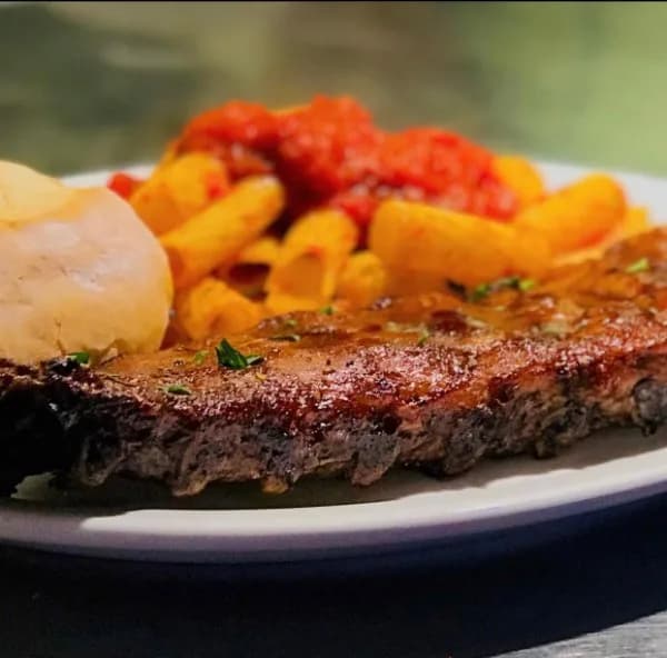 Coste al Forno — barbecued baby back ribs with pasta