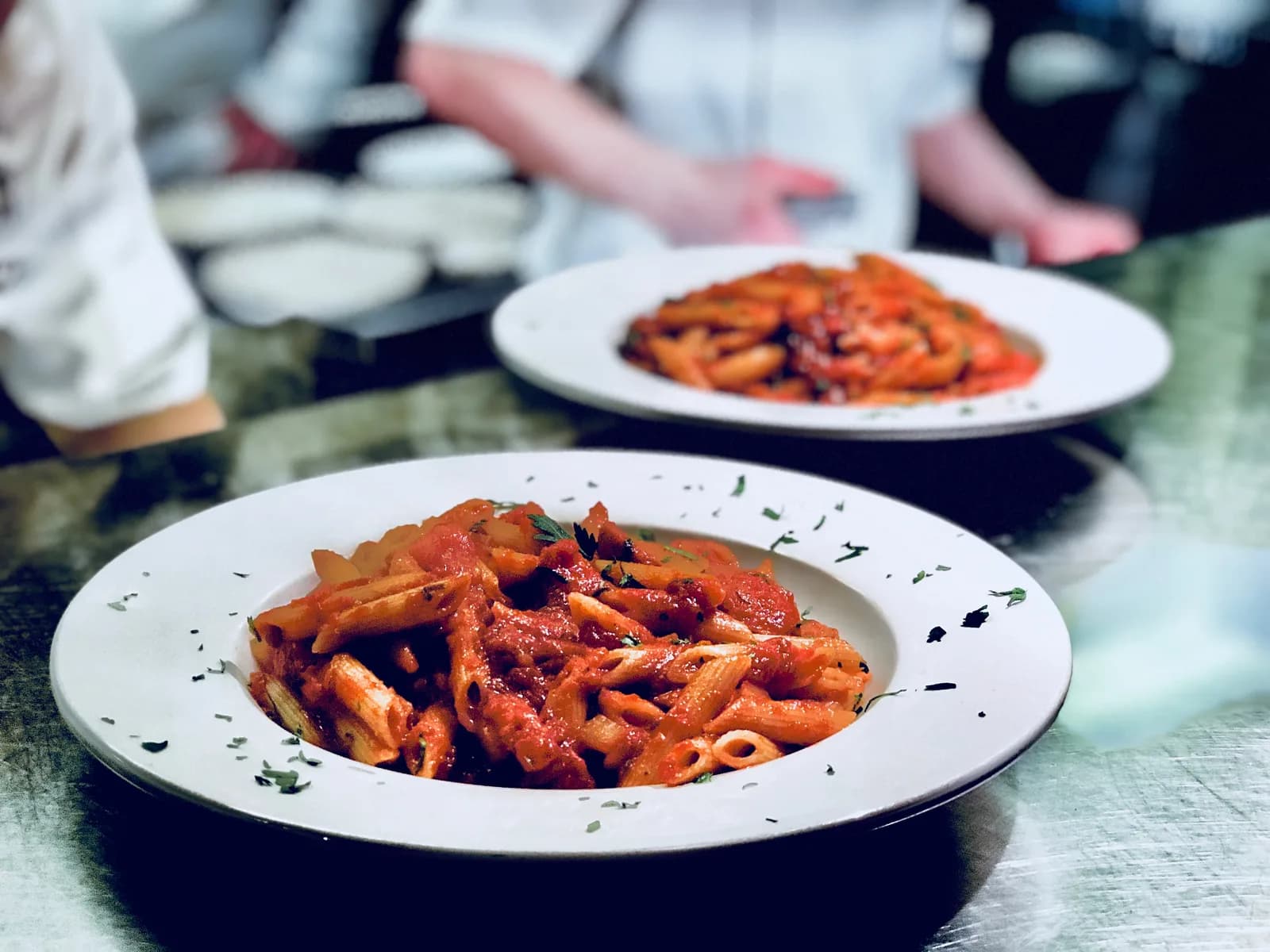Penne arrabbiata in a spicy marinated tomato sauce